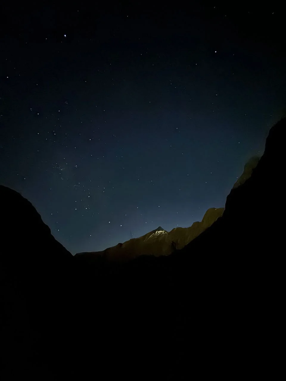 Star-filled sky over the jagged peaks of Mount Aspiring National Park.