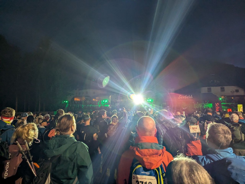 Karwendelmarsch night start with spotlights and runners in Seefeld