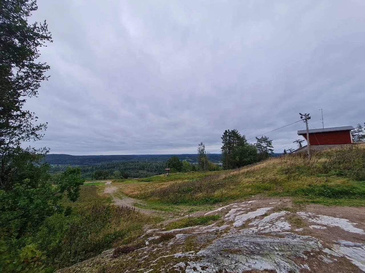Gravel path through rolling hills
