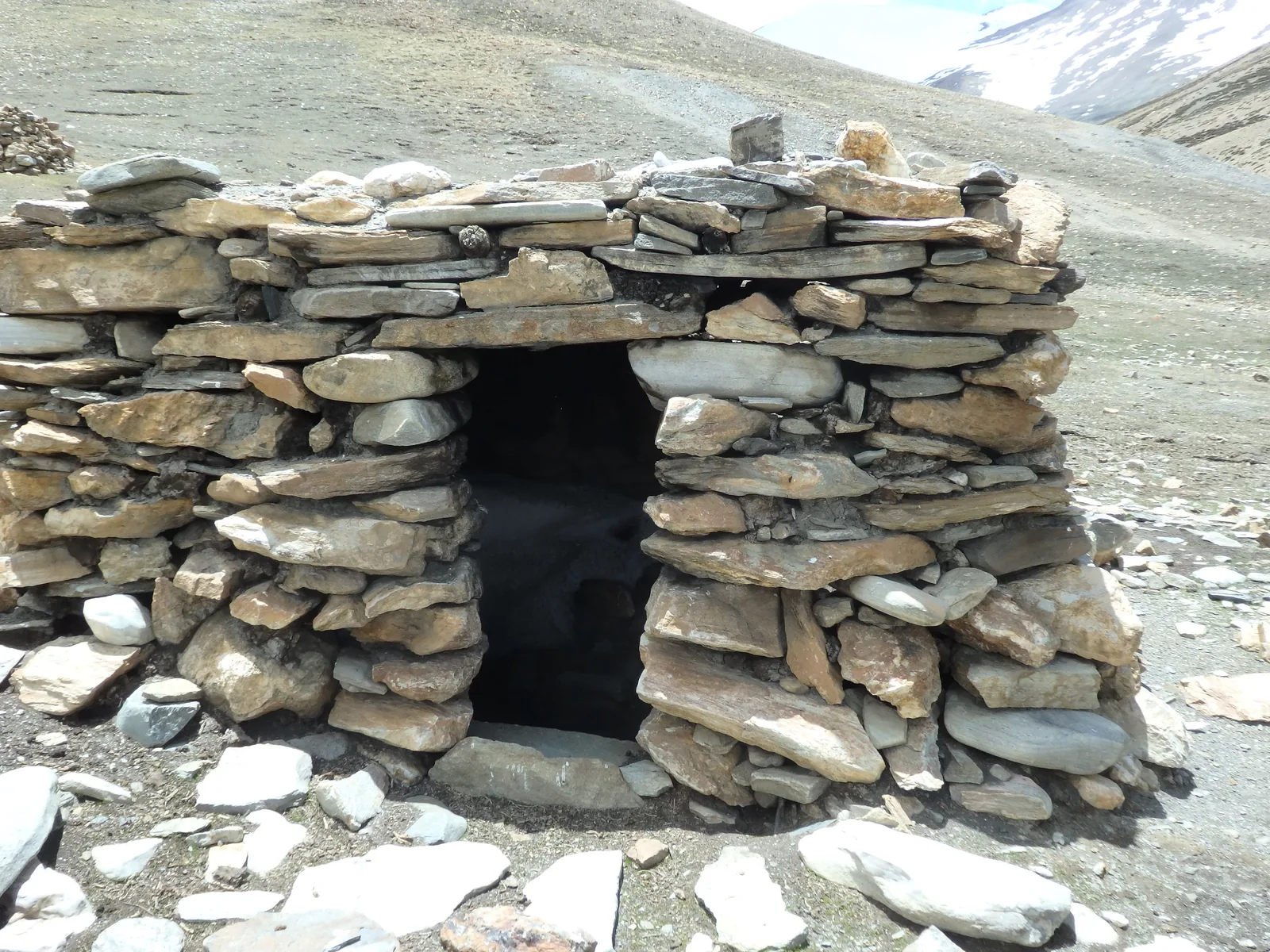 Traditional drystone shepherd shelter in the high grazing amphitheater of Tisaling.