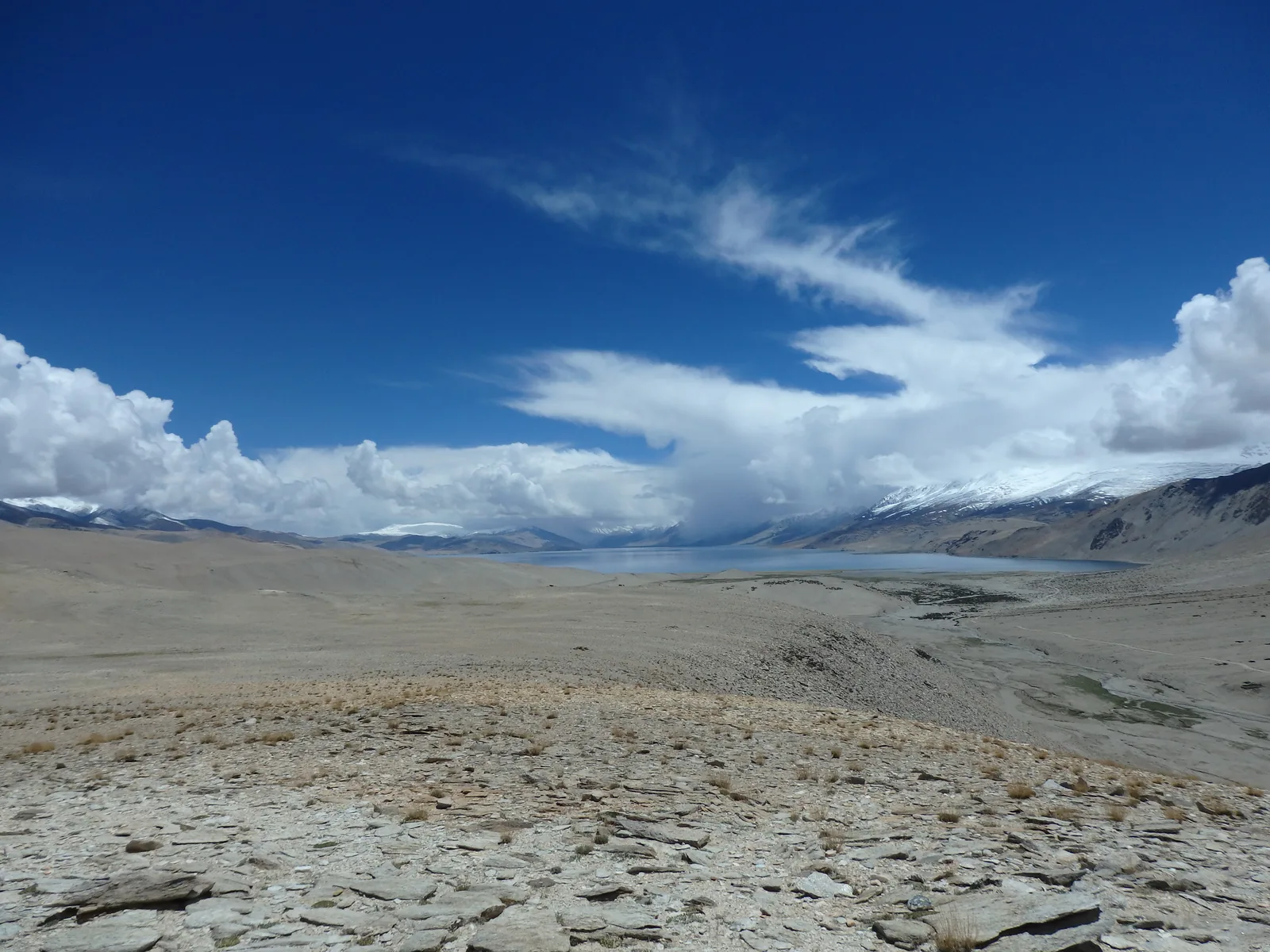 First panoramic vista of the deep sapphire waters of Lake Tso Moriri from the crest of Yalung Nyau La at 5,430 m.